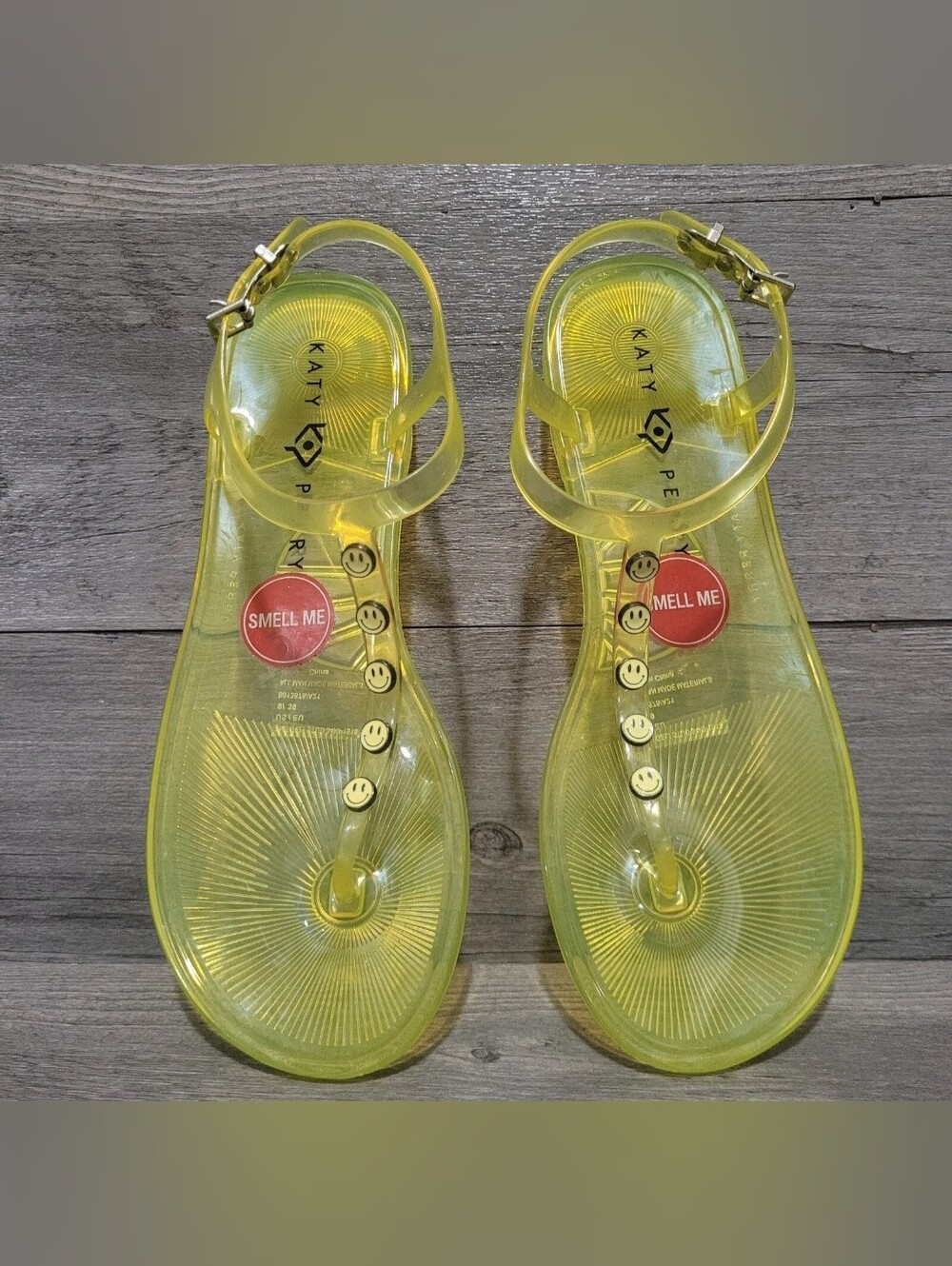 Katy Perry Women's The Geli-T Strap Flat Sandal Smiley FACE/Lemon Drop Size 9
